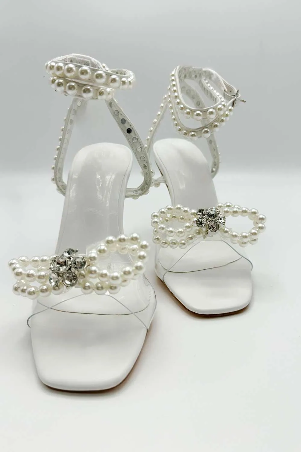 Pearlie Perspex Faux Pearl Bow Detail Heeled Sandals in White