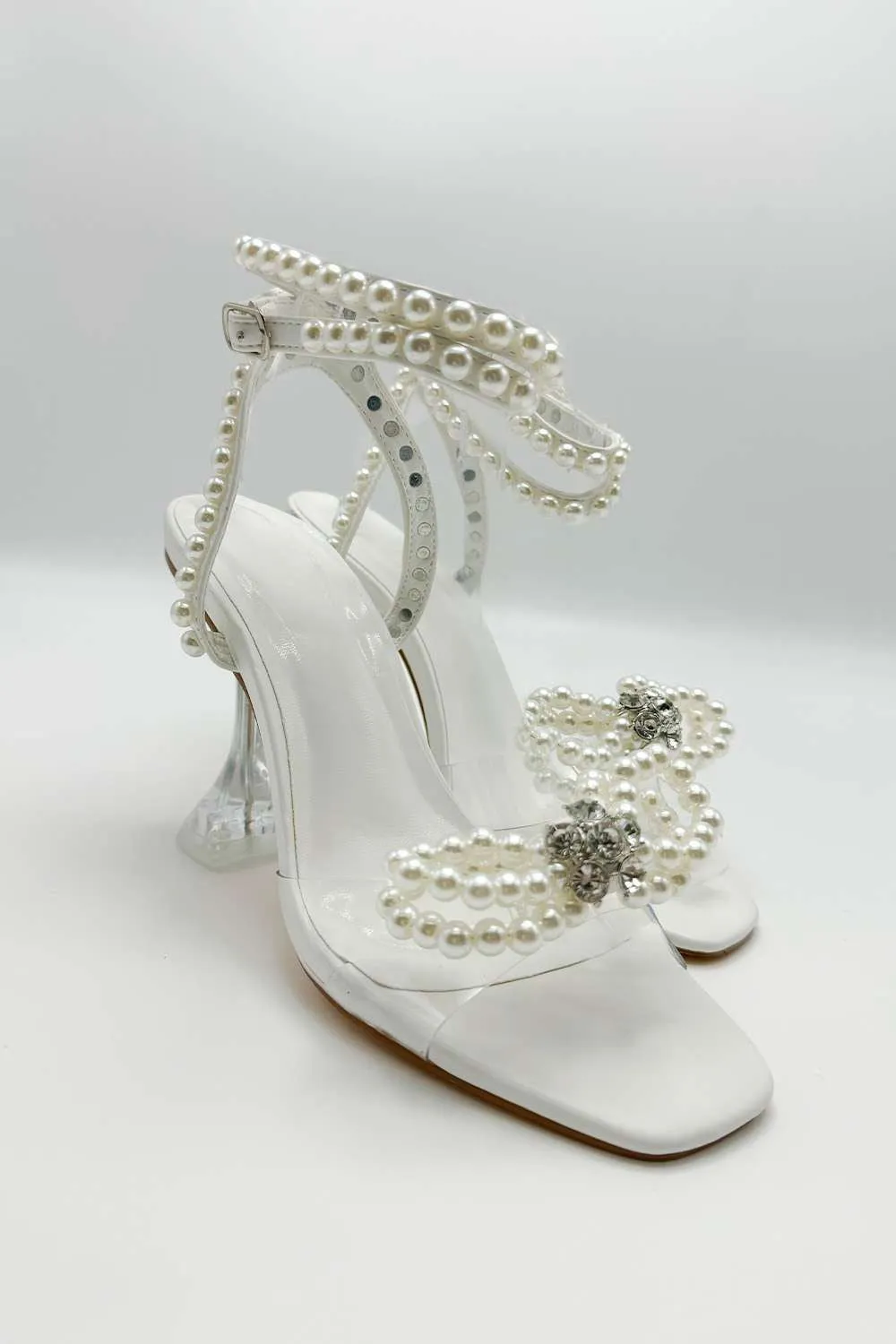 Pearlie Perspex Faux Pearl Bow Detail Heeled Sandals in White
